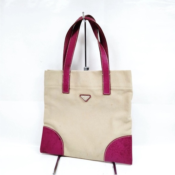 Prada Handbags - Prada Beige Canvas Tote with Pink Leather Handles and Accents